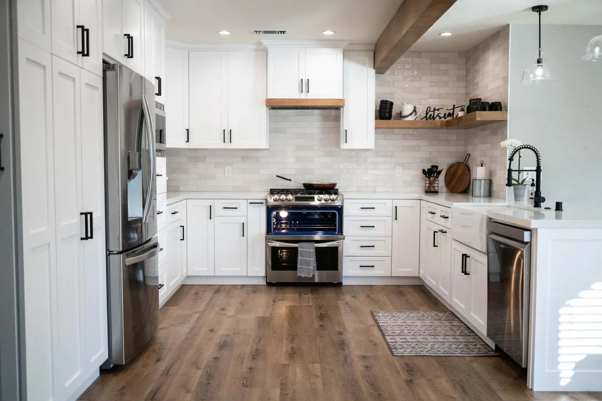 Open-concept kitchen remodel with large prep island in Mercer Island, Washington