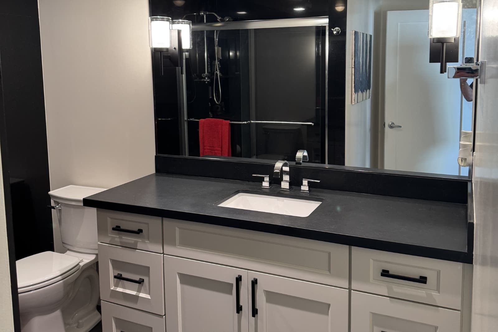 Modern bathroom remodel in Seattle with custom tile, walk-in shower, and updated vanity by Fine Element Construction